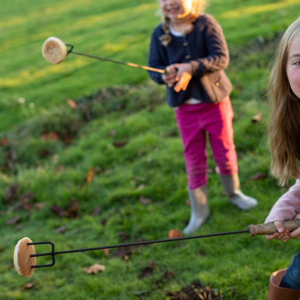 Girls with Toasting Fork - Firepits UK - LoRes 600x600