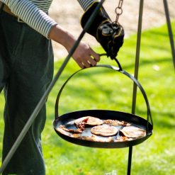 Close up of Hanging Skillet on Celeste 80 with Long Leg Tripod Lit