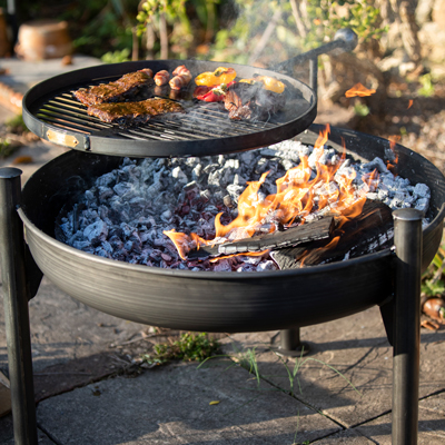 Legs Eleven Fire Pit Lit with Swing Arm BBQ Rack Lifestyle from Above - Firepits UK - WEB - Lo Res.