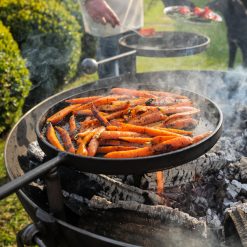 Plain Jane 90 with 3 Swing Arm BBQ Racks Fire Pit close up of carrots Lifestyle - Firepits UK - WEB - Lo Res