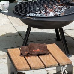 Calypso Lit on Patio with Mesh Rack and Log Seats - Lifestyle - Firepits UK - 600x600 116