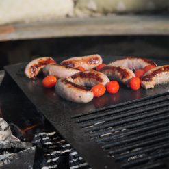 VPit Fire Pit Lit on Patio with Sausages on BBQ Plate Lifestyle - Firepits UK - LoRes 4
