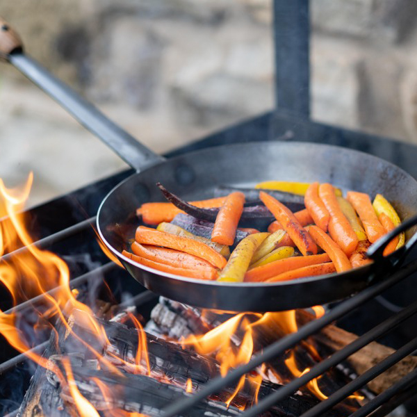 UK Long Handled Pan 34cm - Carrots in fire cage - Firepits UK - Lifestyle - LoRes145600x600
