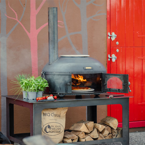 pizza oven alight on table