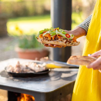 Small Outdoor Wood Burner BBQ - Lifestyle Roo with roll - Firepits UK - WEB 600x600 - Lo Res