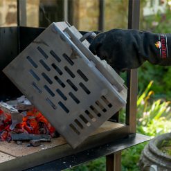 Charcoal Chimney Starter being emptied of lit coals - Lifestyle - Firepits UK - WEB 600x600 - Lo Res 1